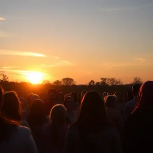A peaceful community gathering at sunset
