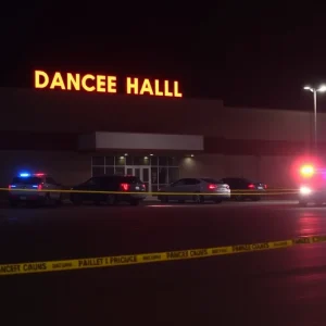 Crime scene in New Braunfels dance hall parking lot after stabbing incident