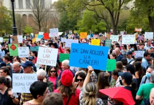 Crowd holding signs at No Kings Day protest in San Antonio