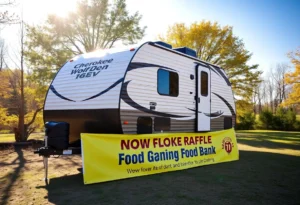 Picture of a 2025 Forest River Cherokee Wolf Den RV in nature for a charity raffle