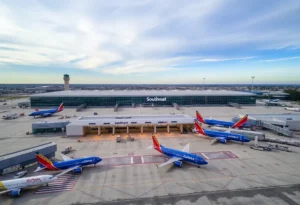 Aerial view of San Antonio International Airport, focusing on Terminal A and Southwest Airlines gates.