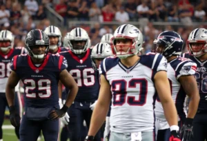 Houston Texans and New England Patriots players in action during AFC Divisional Round