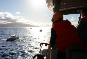 Rescue operation off the coast of Maui with boats in the water.