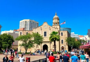 A bustling scene in San Antonio showcasing cultural attractions and tourists.