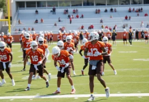 Texas Longhorns football team practicing on the field