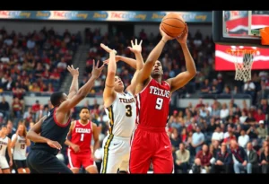 Texas Tech Red Raiders players during basketball victory against West Virginia.
